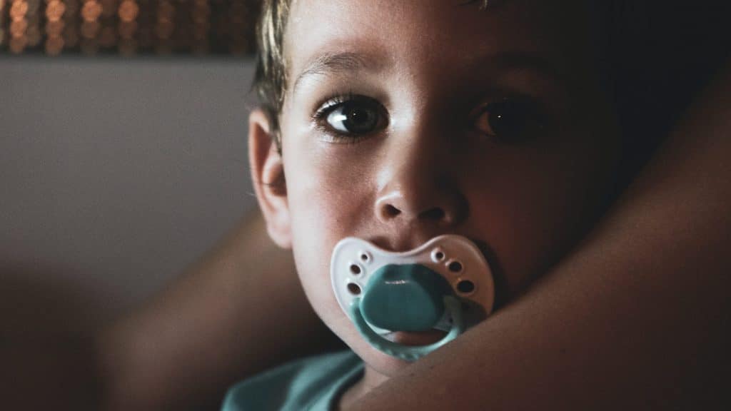 Best non-toxic pacifiers - close-up-photo-of-boy-with-pacifier